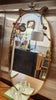 1950s Italian mid-century modern oval wall mirror with classic friezes,