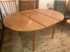 1960’s extendable dining table by Mcintoah