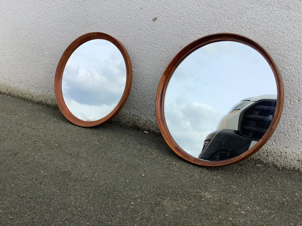 A pair of 1960s Danish  round rosewood  framed mirrors