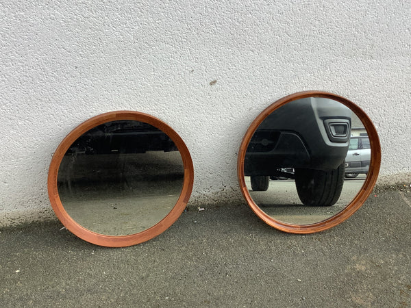 A pair of 1960s Danish  round rosewood  framed mirrors