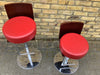 A pair of Poltrona Frau Bar Stools