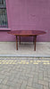 Rosewood round extendable dining table by Mclntosh 1960