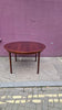 Rosewood round extendable dining table by Mclntosh 1960