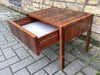 A pair  of Danish rosewood bedside cabinets
