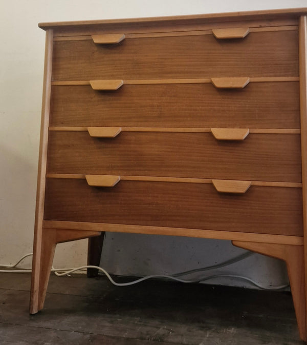 A Rare early 1950's Heals walnut and beech chest of draws