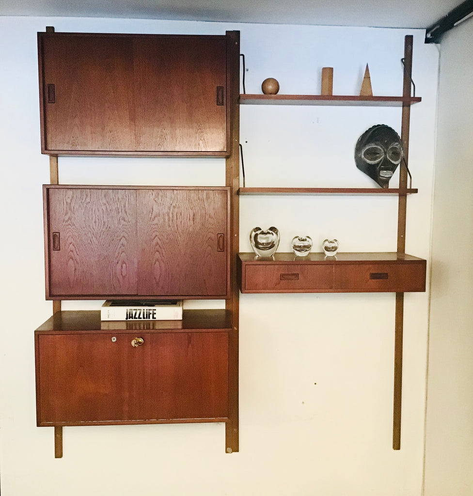 Danish Mid Century wall Shelving by Poul Cadovius