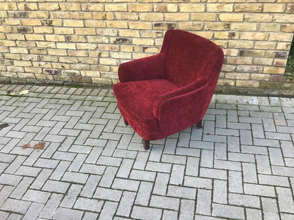 Small vintage upholstered armchair