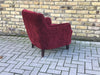 Small vintage upholstered armchair