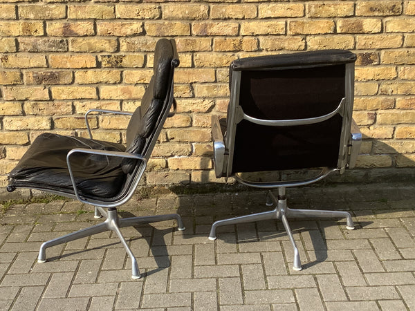 A pair of Herman Miller Aluminium Group lounge chairs